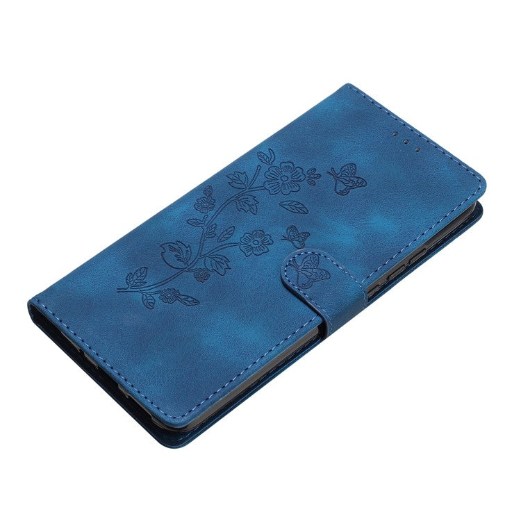 For Google Pixel 9 / Pixel 9 Pro Case Leather Imprinted Flower Phone Cover Wallet with Wrist Strap - Blue