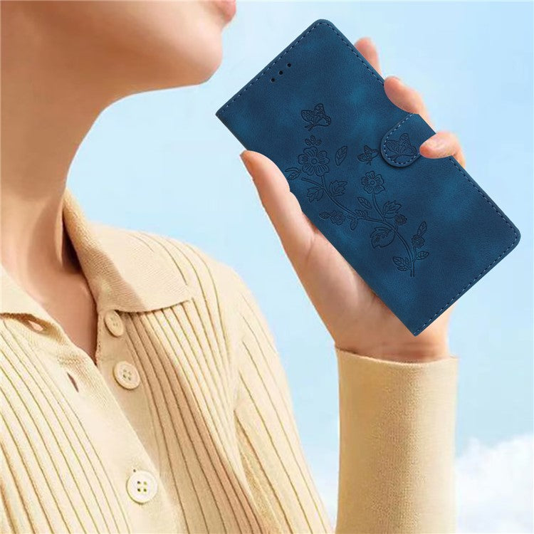 For Google Pixel 9 / Pixel 9 Pro Case Leather Imprinted Flower Phone Cover Wallet with Wrist Strap - Blue