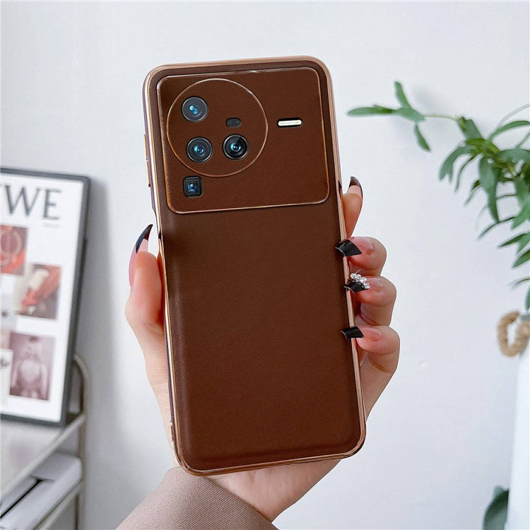 For vivo X80 Pro 5G Genuine Leather Coated PC+TPU Drop-Proof Case Electroplating Edges Design Shockproof Protective Cover - Coffee