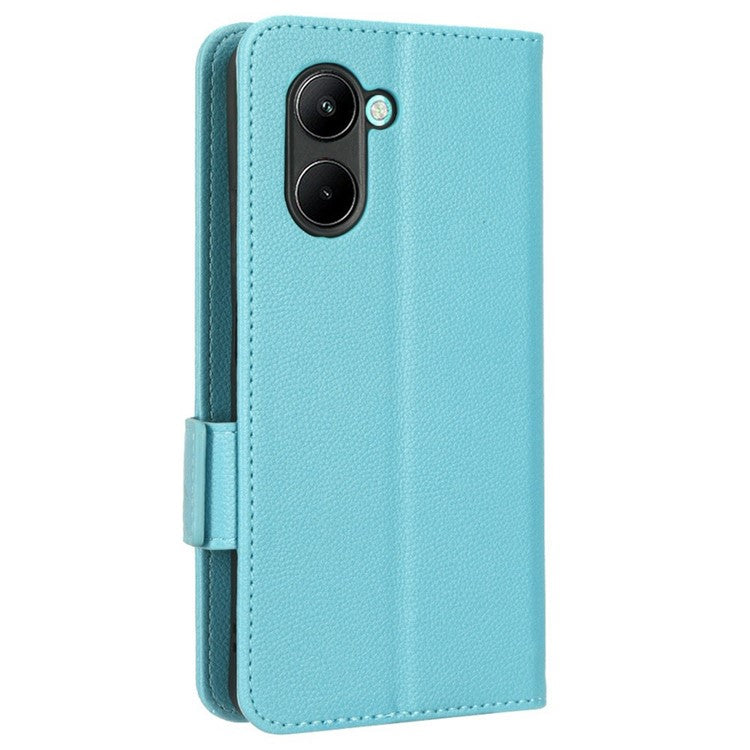 For Realme C33 4G PU Leather Magnetic Protect Phone Case Litchi Texture Wallet Stand Cover with Wrist Strap - Baby Blue