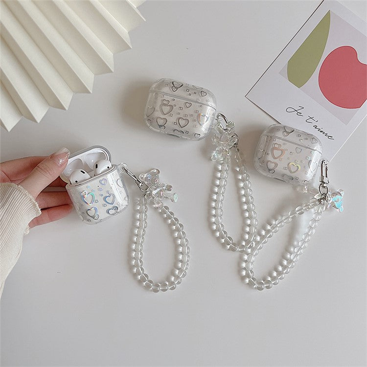 For Apple AirPods with Charging Case (2016)/(2019) / AirPods with Wireless Charging Case (2019) Stylish Transparent TPU Cover Electroplating Love Heart Pattern Earphone Case with Bear Pendant Bracelet