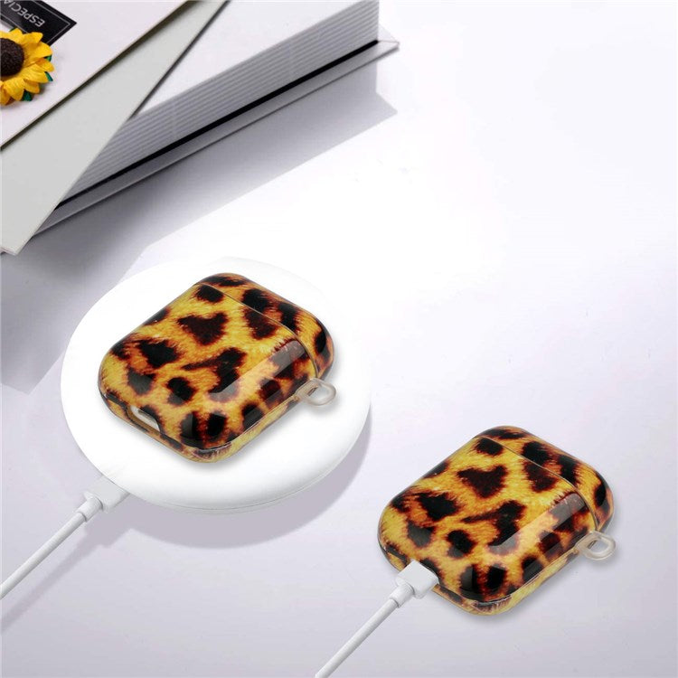 For Apple AirPods with Charging Case (2016)/(2019)/AirPods with Wireless Charging Case (2019) IMD Pattern Printing Earphone Case Soft TPU Protective Cover with Hook - Yellow Leopard