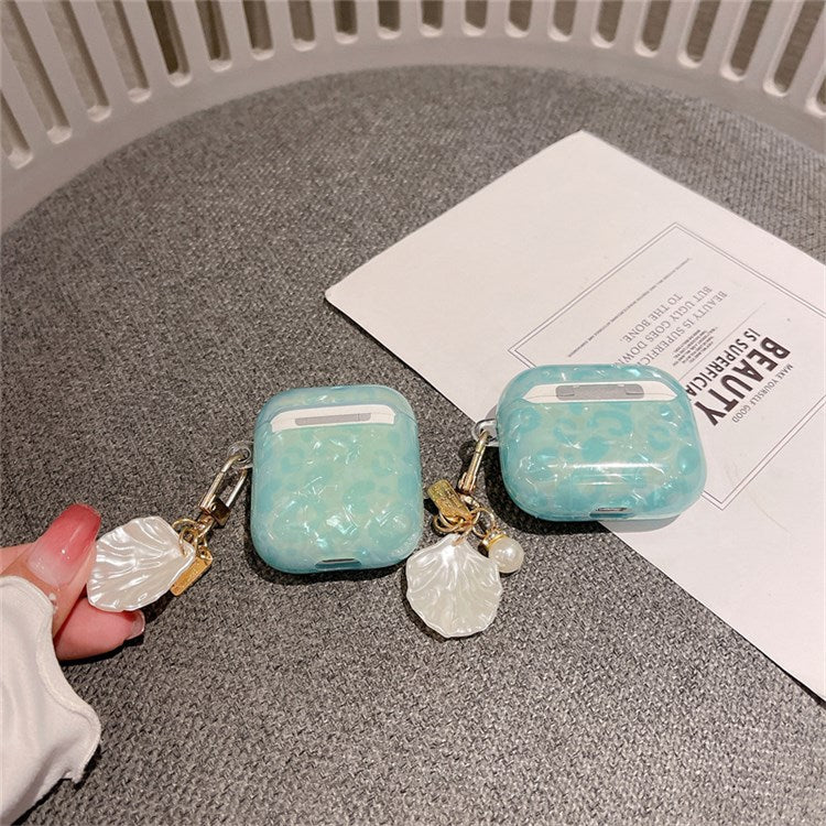 For Apple AirPods with Charging Case (2016)/(2019)/AirPods with Wireless Charging Case (2019) TPU Bluetooth Earphone Charging Case Shell Grain Protective Cover with Shell Shape Pendant