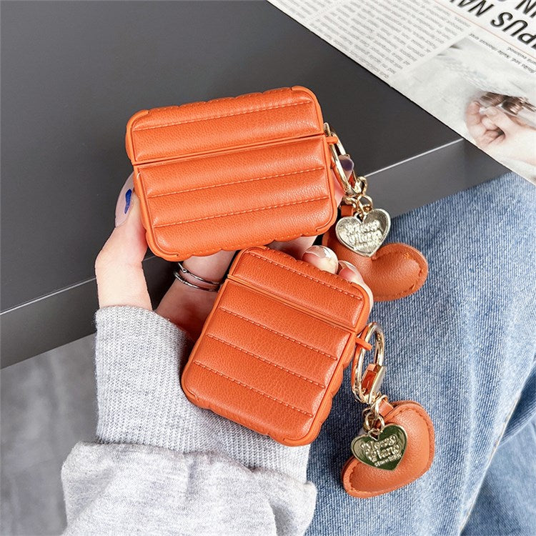 For Apple AirPods with Charging Case (2016) / (2019) / AirPods with Wireless Charging Case (2019) Down Jacket Pattern Earphone Case Stylish Leather+TPU Protective Cover with Heart Pendant - Orange