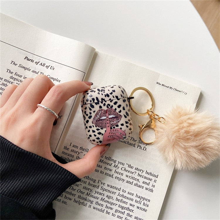 For Apple AirPods with Charging Case (2016)  /  (2019)  /  AirPods with Wireless Charging Case (2019) Anti-Drop Cover Lip Leopard Pattern TPU Headset Case with Hair-Ball Pendant