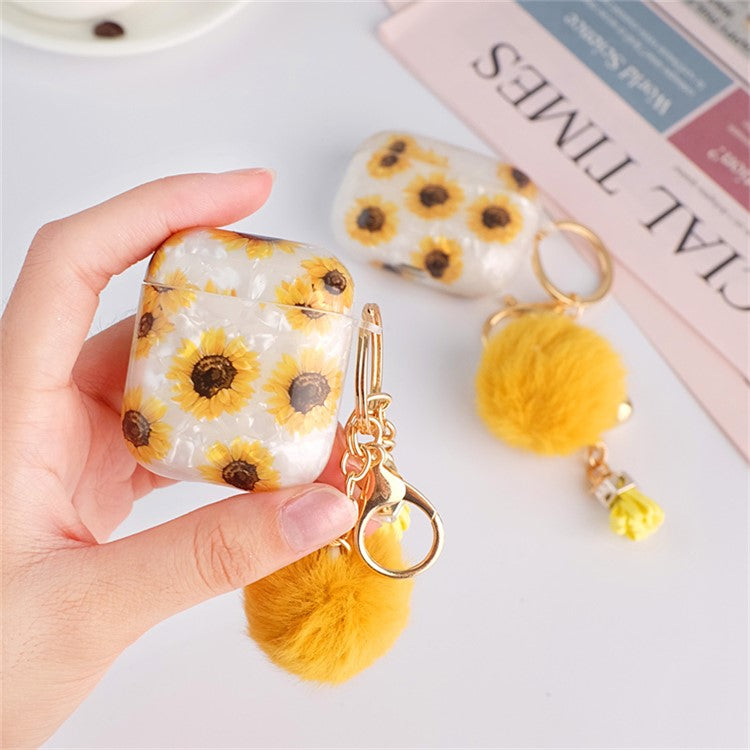 For Apple AirPods with Charging Case (2016)  /  (2019)  /  AirPods with Wireless Charging Case (2019) Shockproof TPU Cover Shell Texture Sunflower Pattern Headset Case with Hair-Ball Pendant