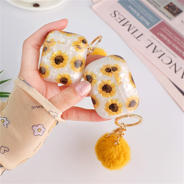 For Apple AirPods with Charging Case (2016)  /  (2019)  /  AirPods with Wireless Charging Case (2019) Shockproof TPU Cover Shell Texture Sunflower Pattern Headset Case with Hair-Ball Pendant