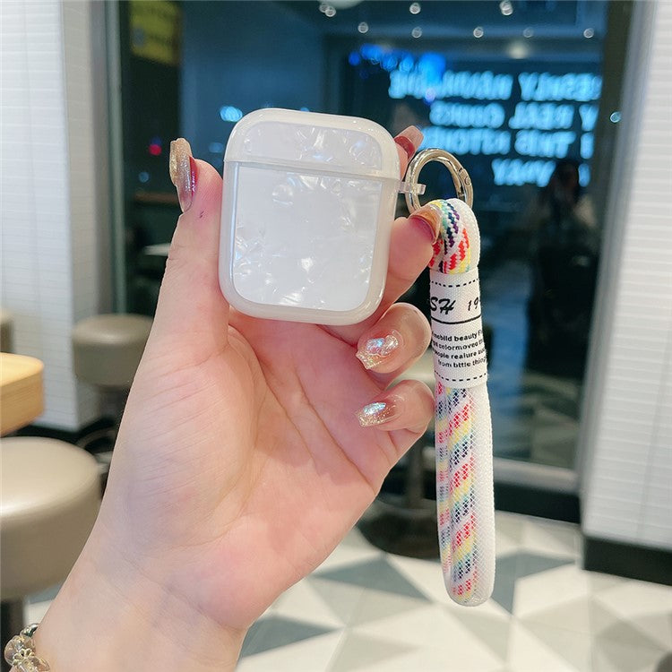 For Apple AirPods with Charging Case (2016) / (2019) / AirPods with Wireless Charging Case (2019) TPU Protective Case with Strap - Shell Pattern