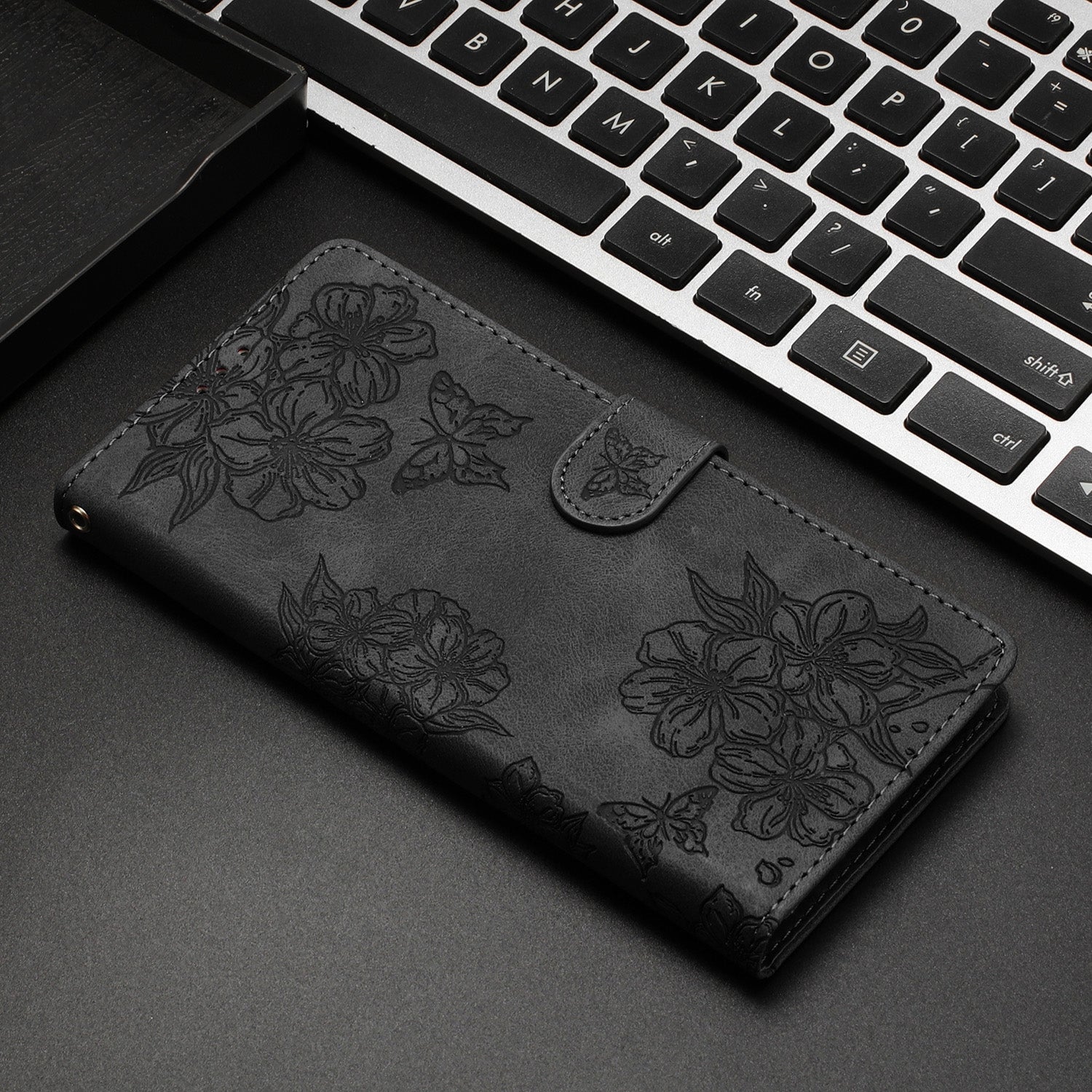 For Redmi 14C 4G Cherry Blossom Butterfly Skin Feel Embossed PU Phone Case(Black)