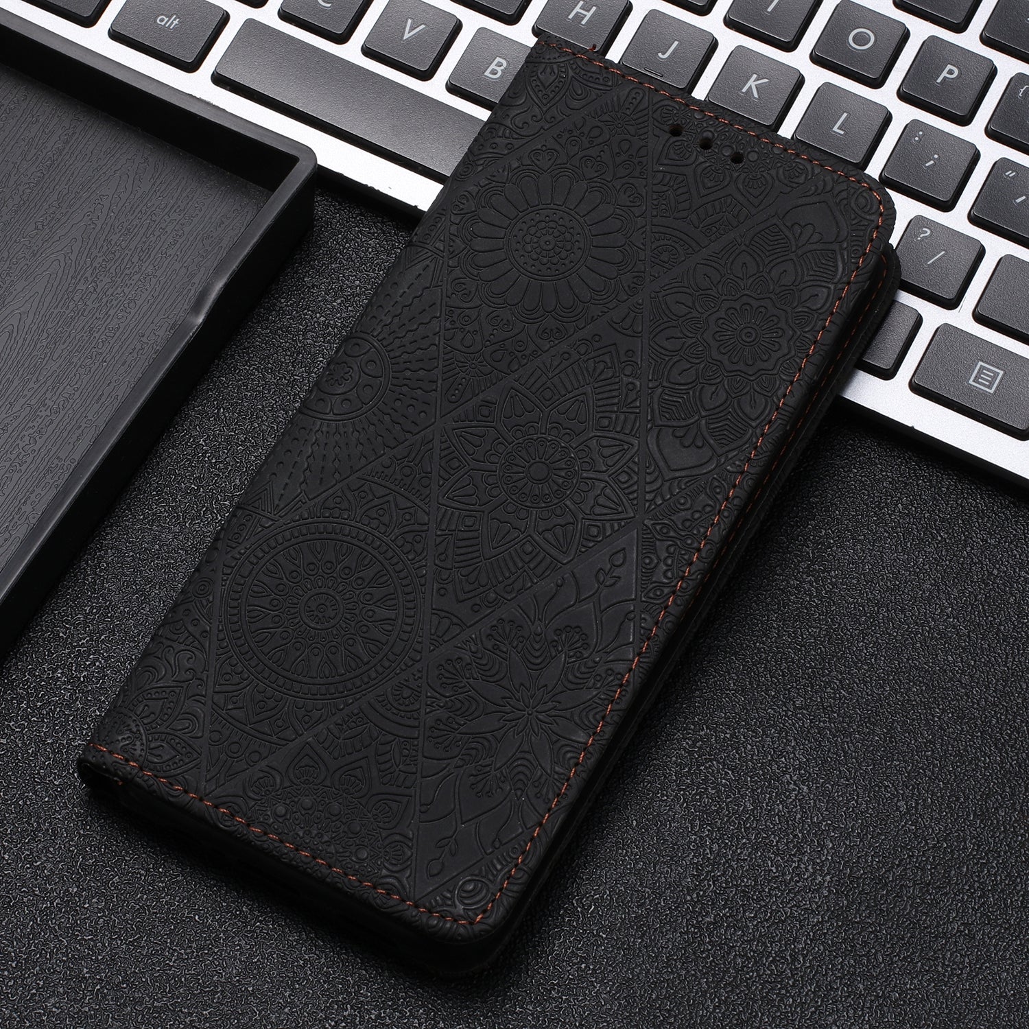 For Redmi 14C 4G Ethnic Embossed Adsorption Leather Phone Case(Black)